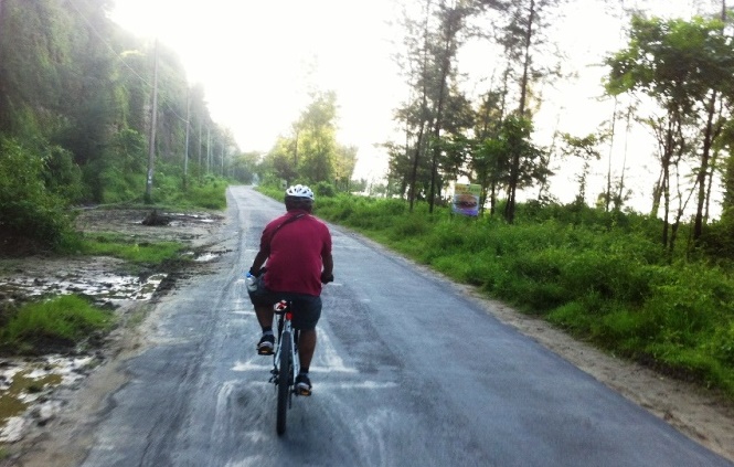 Bicycling on the marine drive road, Cox's Bazar